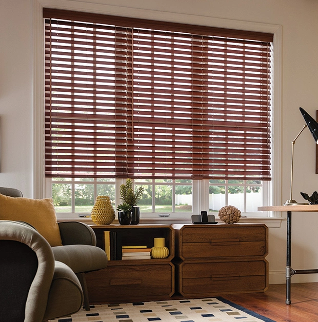 Dark brown blinds in small living room