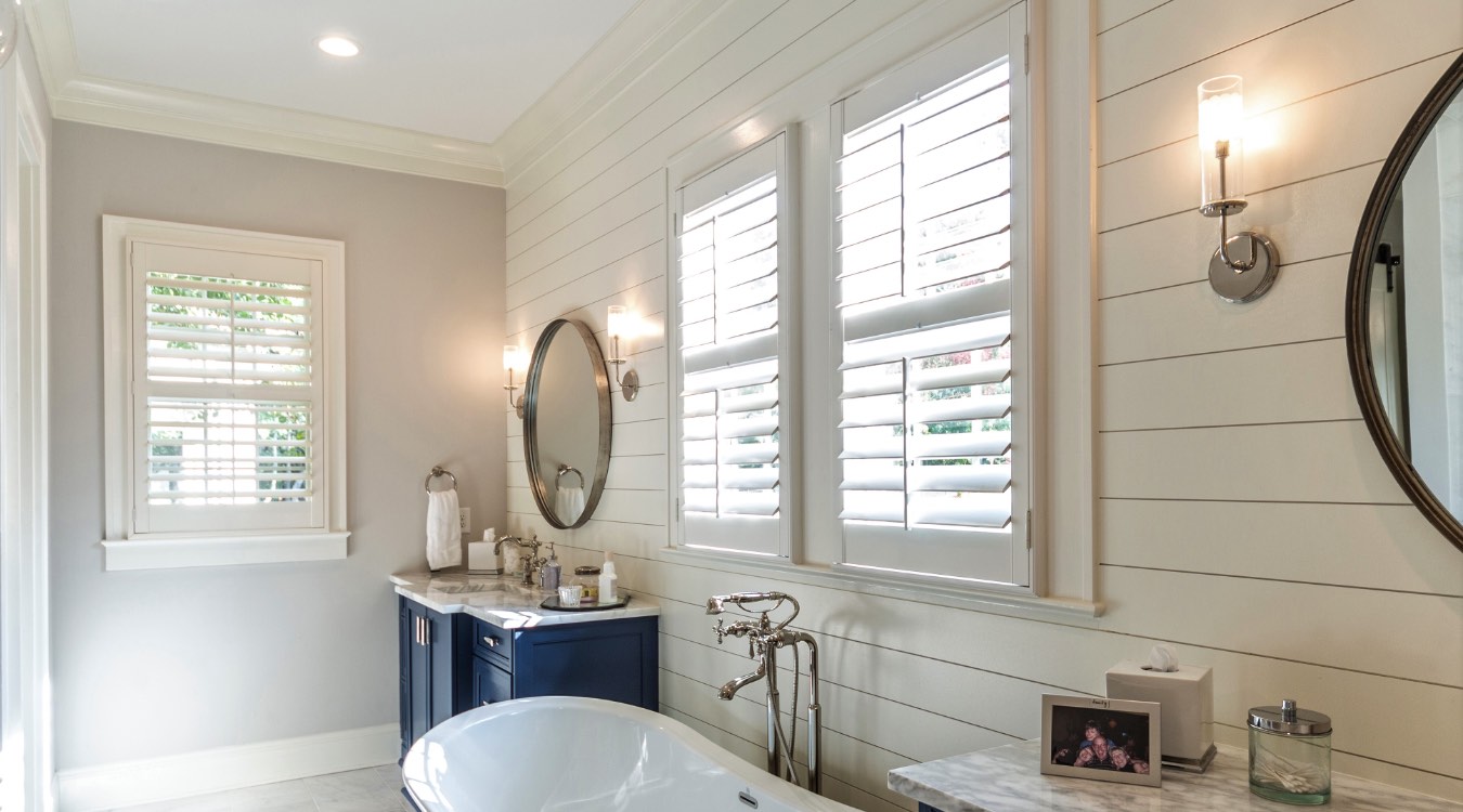 Indianapolis bathroom with white plantation shutters.