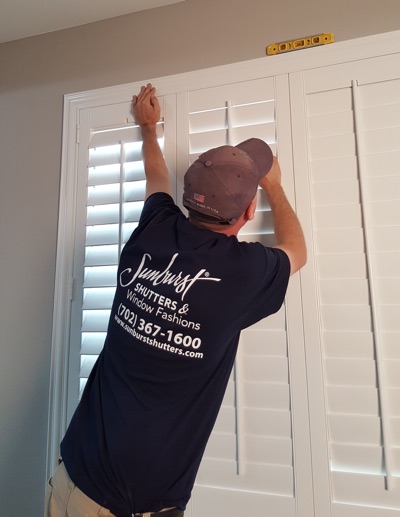 Shutter installation in Indianapolis bedroom.