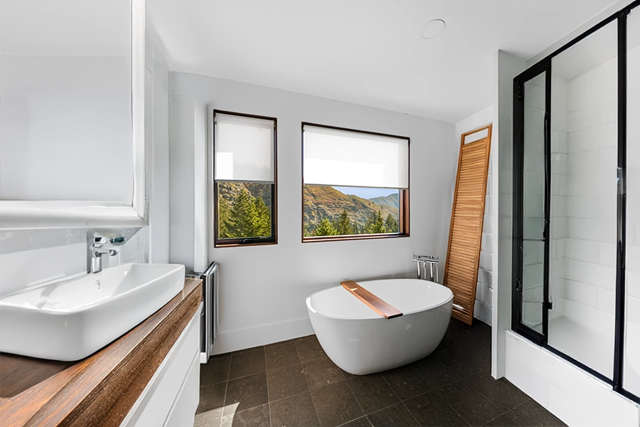White window shades on bathroom windows