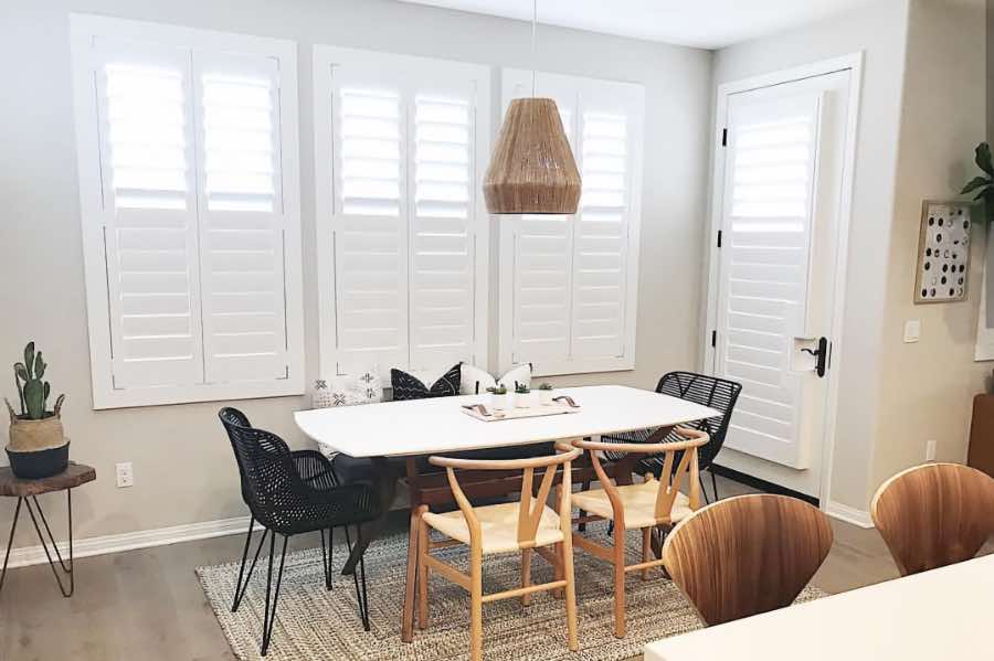 Use Polywood shutters to control natural light levels in your Indianapolis dining room. Polywood shutters with top louvers tilted open in a dining room
