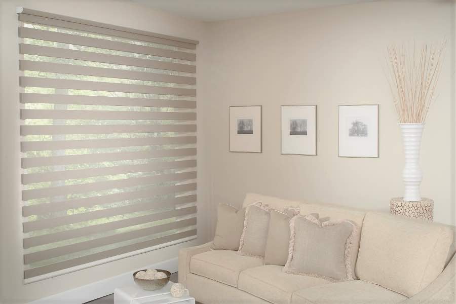 Zebra shades give you a unique combination of light control and style that benefits your Indianapolis home. Zebra shade allows filtered light into a living room