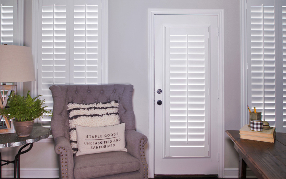 Interior shutters are beautiful and durable window treatments for glass doors in Indianapolis. Polywood shutters on a door