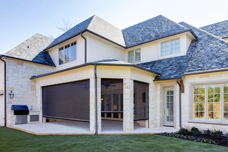 Screen shades enclosing a home patio